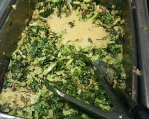 Greens with spicy peanut sauce